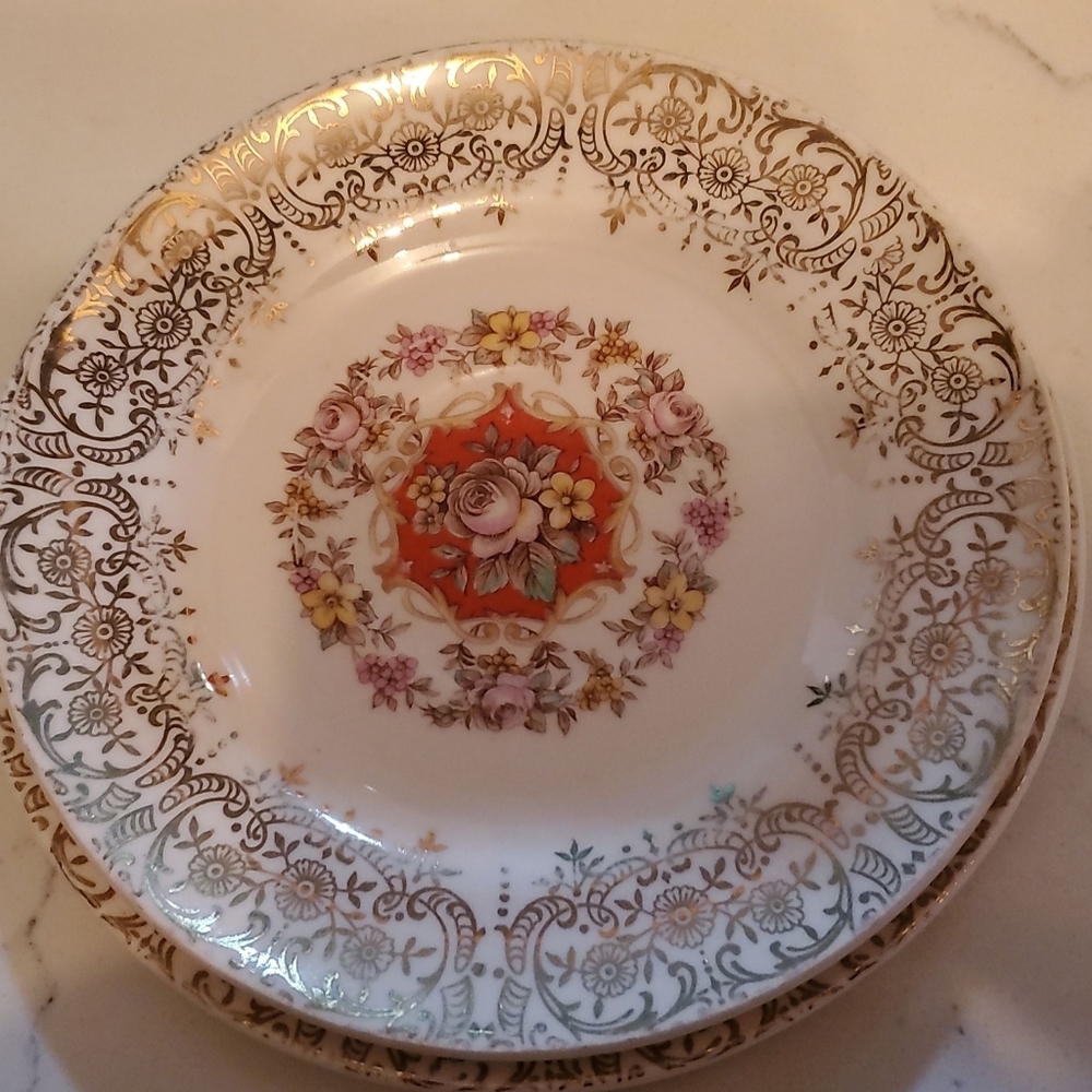 The sebring pottery Co set of 4 plates 22k gold